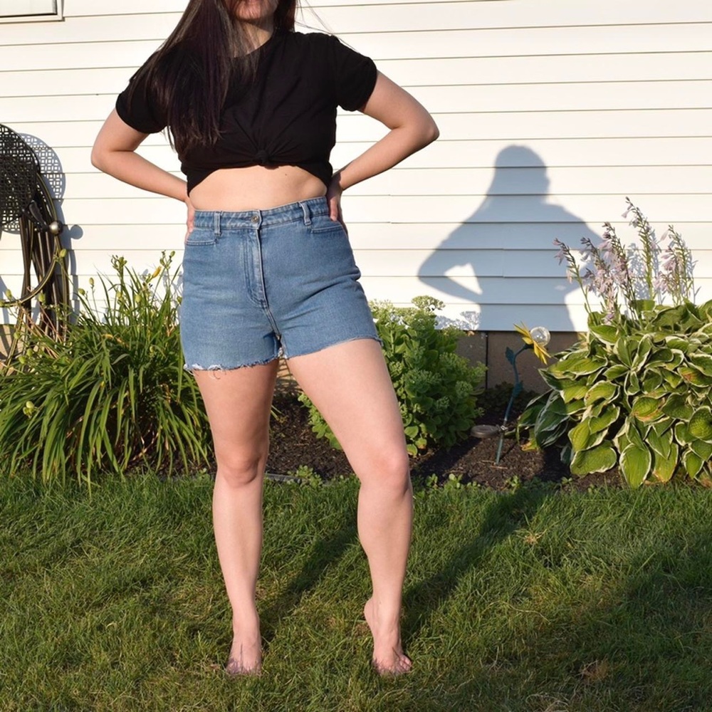 Christopher & Banks light wash denim shorts with a raw edge cut